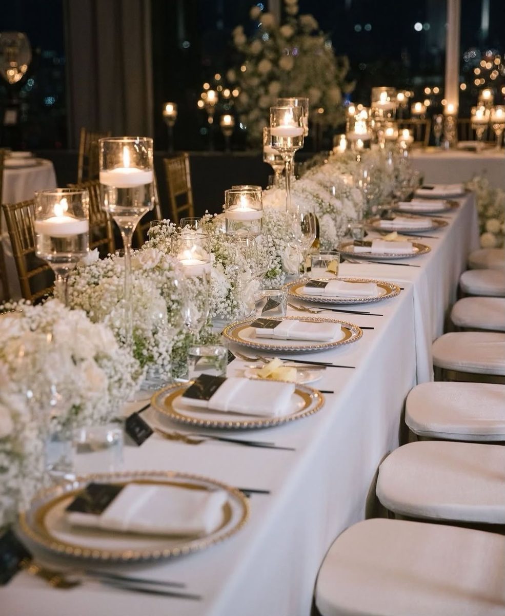Floral centerpiece and candlelit tablescape